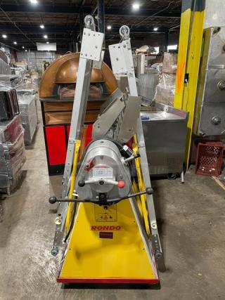 Seewer Rondo electric dough sheeter, model SS064C, yellow, reversible, fold-up conveyor, on casters, SN: A6019004.