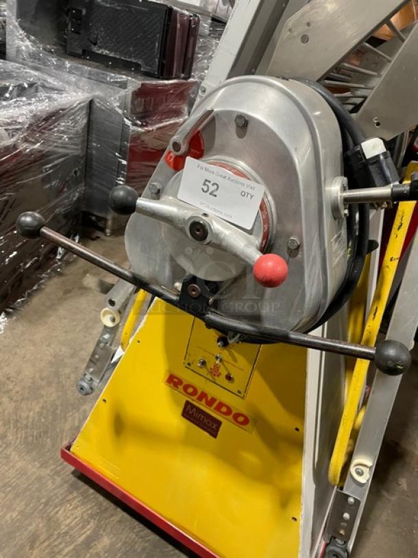 Seewer Rondo SS064C electric dough sheeter with fold-up conveyor, yellow finish, on casters, showing model label.