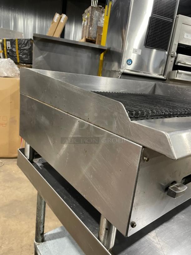 Apexra stainless steel gas countertop char broiler with back and side splash, on legs, in good condition.