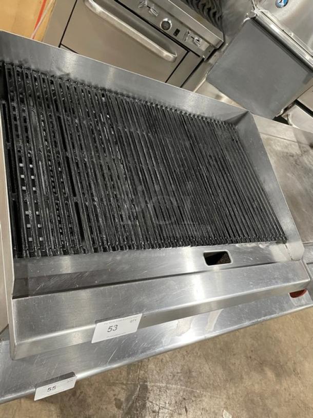 Apexra stainless steel countertop char broiler with back and side splash, gas powered, on legs, good condition.
