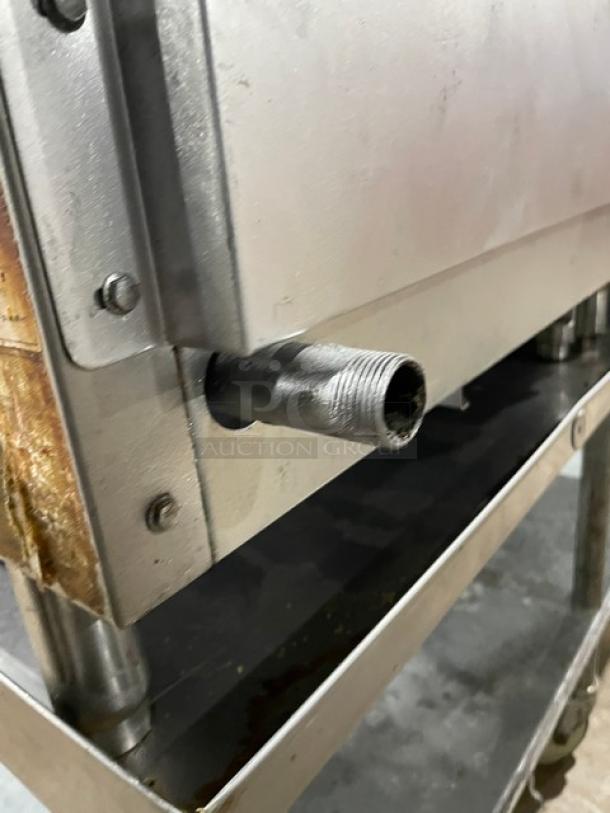 Core Pro Cooking stainless steel natural gas countertop flat griddle, model CP-G24-M, on legs, with back and side splash.