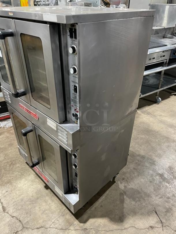 Southbend SL-Series stainless steel double stacked convection oven, gas powered, with thermostatic control, wired rack, on casters.