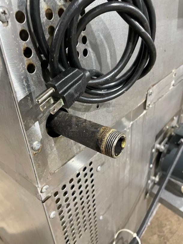 Southbend SL-Series commercial stainless steel gas convection oven, thermostatic control, wired rack, on casters, double stacked.