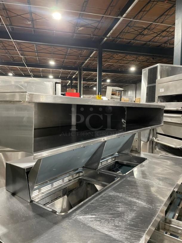 Delfield stainless steel 4-drawer refrigerated prep table, model UCD4464N12DD5, with overhead storage, used condition.