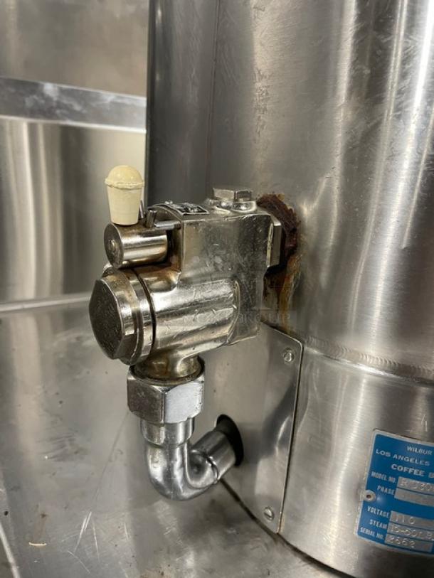 Curtis RU300 stainless steel coffee urn, 3-gal capacity, push button, 110V, commercial use, visible rust, model and serial number tag.