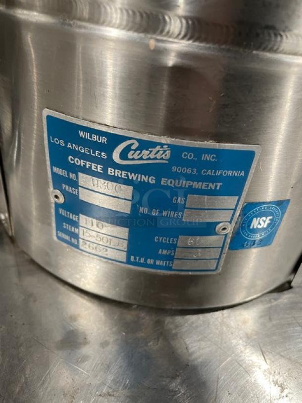 Curtis RU300 stainless steel coffee urn label, showing model, voltage, and serial number: 2662. NSF certified.