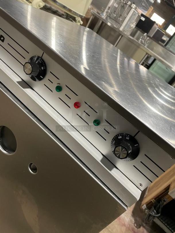 Rofco B40 commercial stainless steel 3-deck stone bread oven, 2020 model, 230V, electric powered, control panel detail.