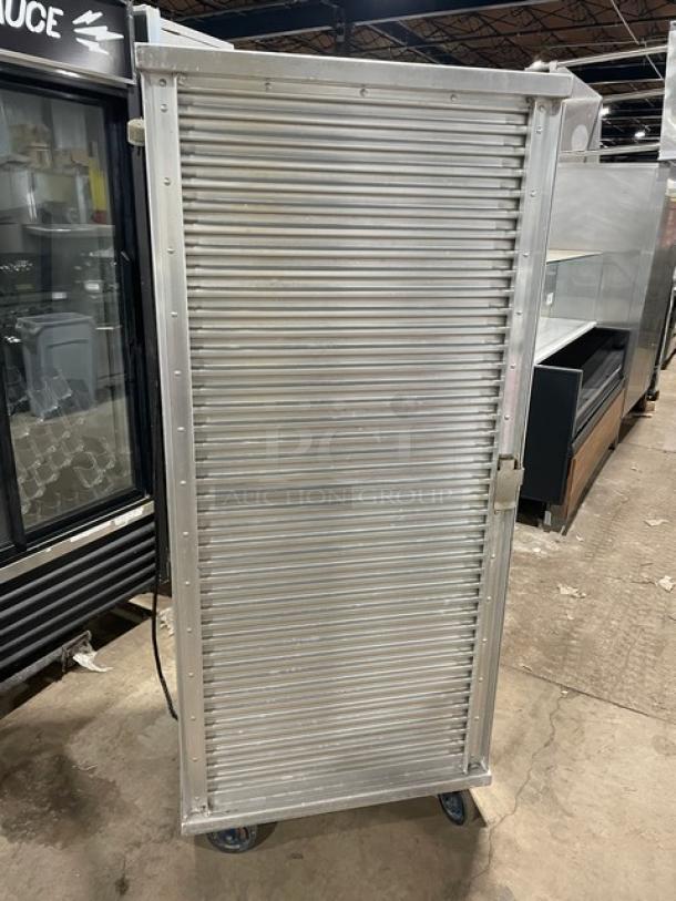 Cres-Cor commercial electric full-height heated holding/proofing cabinet with pan slides, 110-120V, on casters, used condition.