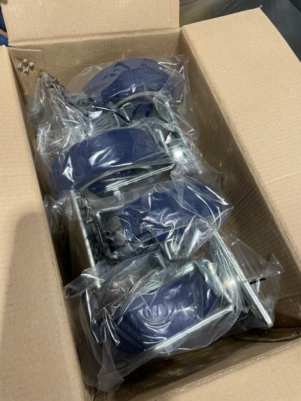 Focus Foodservice 5" polyurethane casters, model FPCST5HD, new in box, with stainless steel 4" mounting plates and brakes.