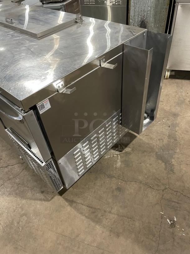 Continental stainless steel refrigerated salad/sandwich prep table, model RA68NB, with poly-coated rack, on casters.