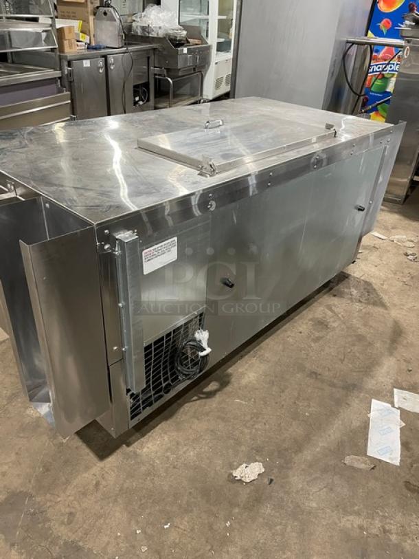 Continental Commercial Stainless Steel Prep Table, Model RA68NB, with poly-coated rack, 2-1/2 doors, and casters.