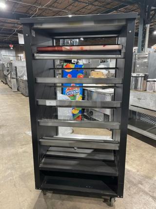 Vulcan 5-Tier Black Lighted Donut/Bagel Merchandiser, Model 1013776, stainless interior, storage below, on casters, 120V.
