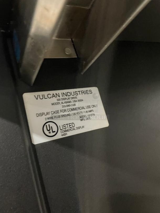 Vulcan 5-Tier Black Bakery Merchandiser, Model 1013776, stainless steel interior, enclosed storage, 120V, on casters.