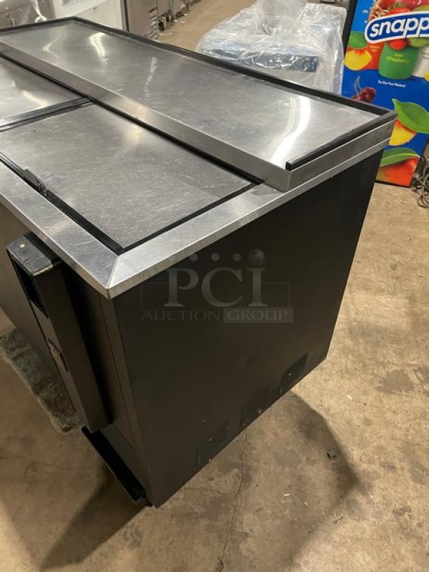 True TD-50-18 black 50" bottle cooler, stainless steel worktop, dual easy-slide lids, 115V, model TD5018, SN: 6945613.