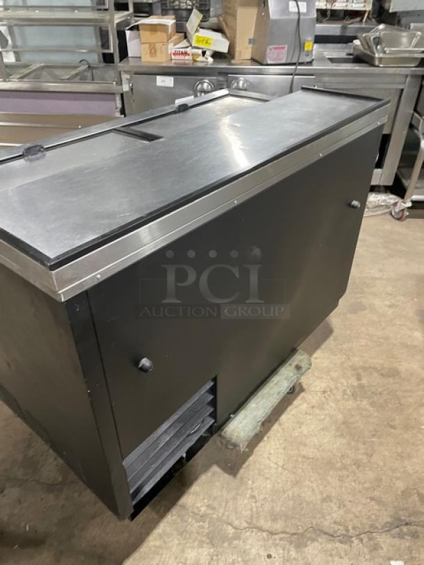 True Commercial 50" black bottle cooler, model TD-50-18, with stainless steel worktop and dual slide lids.