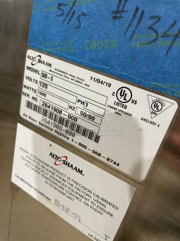 Alto-Shaam Model 500-S heated cabinet with label details: 120V, 1 Phase, SN 2641908-000. Stainless steel, on casters.
