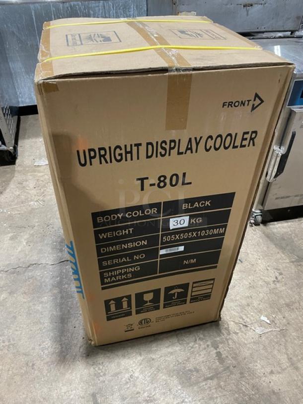 New ProCool T-80L Commercial Black Single Glass Door Upright Merchandiser Refrigerator in box. Dimensions: 505x505x1030mm. Weight: 30kg.