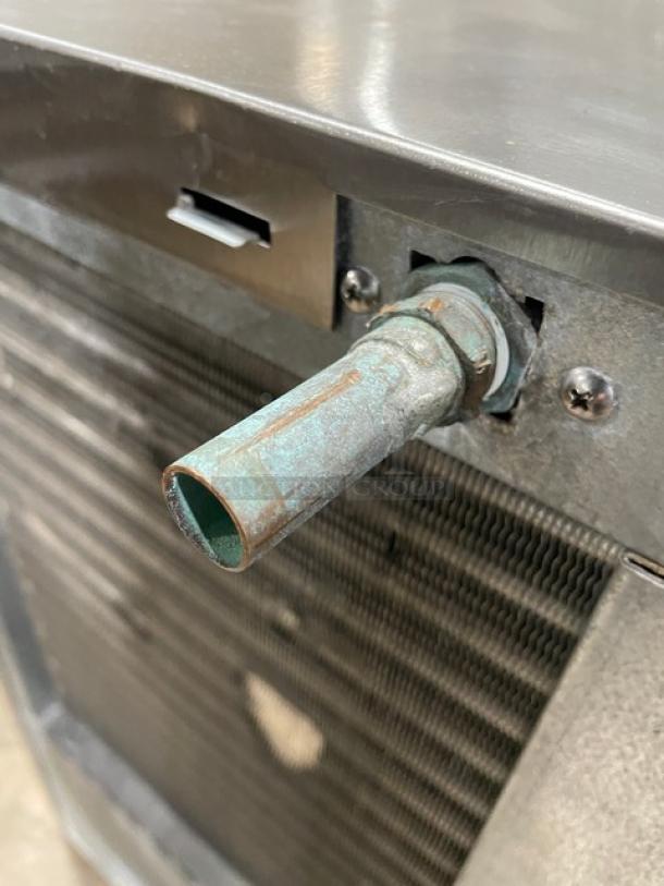 Hoshizaki KM-660MAJ ice maker, stainless steel, air-cooled, crescent cube style, visible worn connector, model KM660MAJ, 115V.