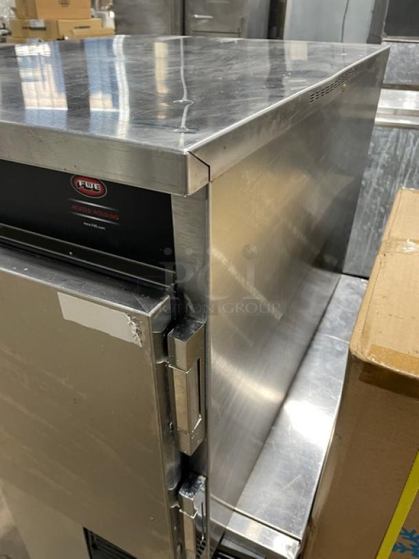 FWE Handy Line Series stainless steel countertop heated holding cabinet, model HLC-1826-3-CHP, electric, 3-pan capacity, used.