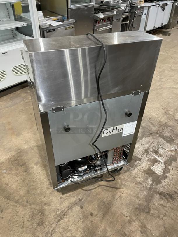 2021 Atosa MSF8305GR stainless steel refrigerated prep table, bain marie style, with poly-coated rack, on casters.