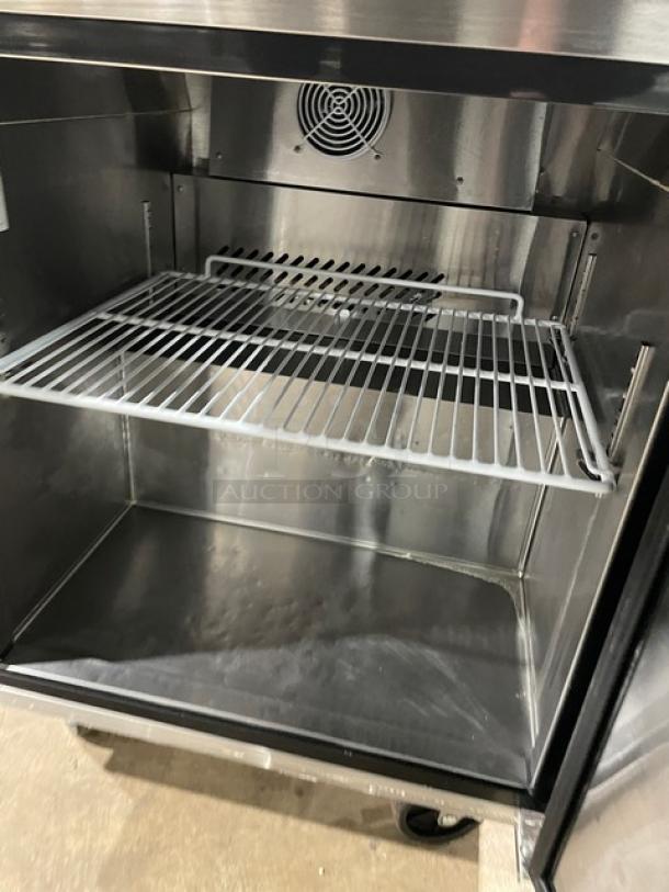 Atosa 2021 stainless steel refrigerated prep table, model MSF8305GR, with poly-coated wire rack, on casters.