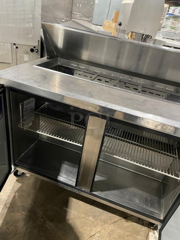 Turbo Air MST-48-N stainless steel 2-door refrigerated bain marie style prep table with poly coated rack, 115V, on casters.