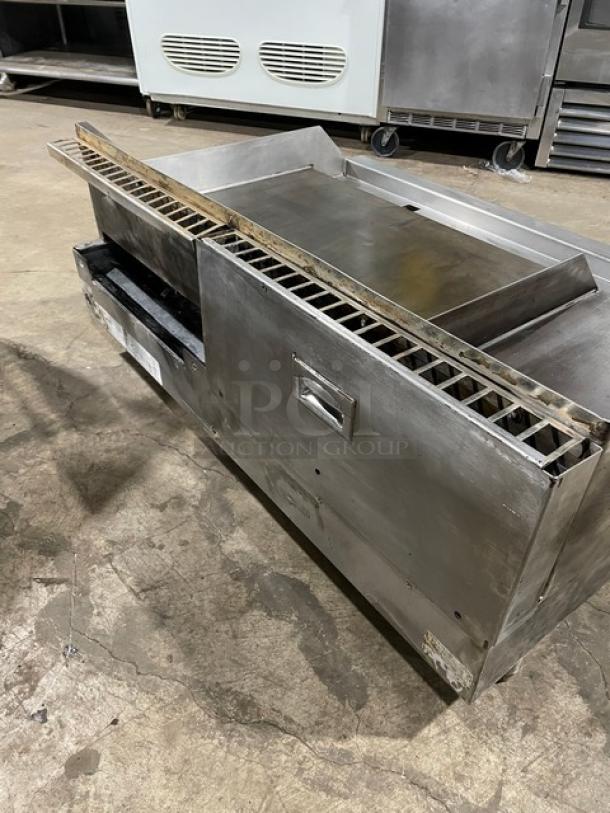 Woodstone stainless steel natural gas plancha griddle, split-top style, with back and side splash. Used condition.