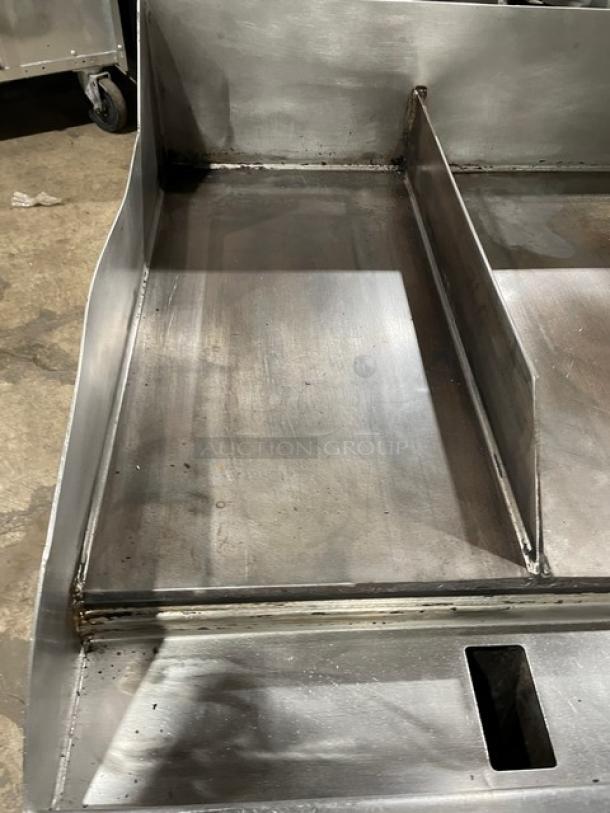 Woodstone stainless steel natural gas plancha griddle, split-top, with back and side splash, used condition.