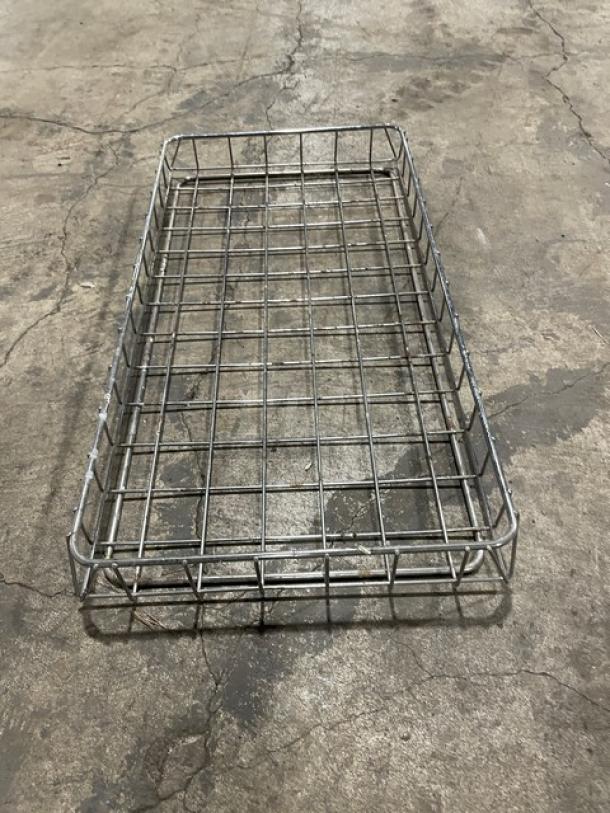 Chrome-plated wired rack for bagels/pastries, full-size, commercial use. Good condition, durable and versatile.