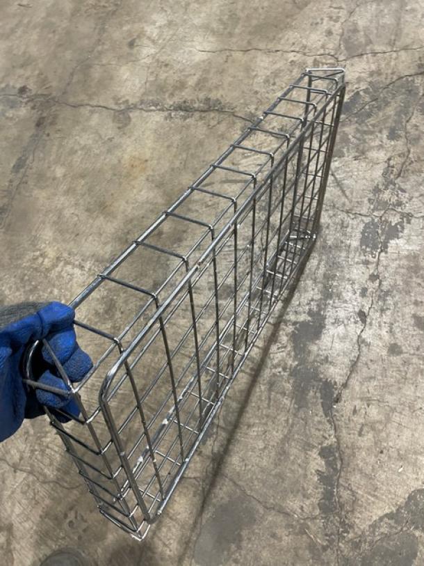 Commercial chrome plated full-size bagel/pastry wired rack shown upright. Good condition, visible welded joints.