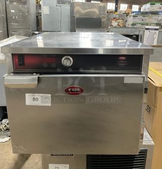 FWE HLC-1826-3-CHP stainless steel heated holding cabinet; electric, insulated; 3-pan capacity; model shown in warehouse setting.