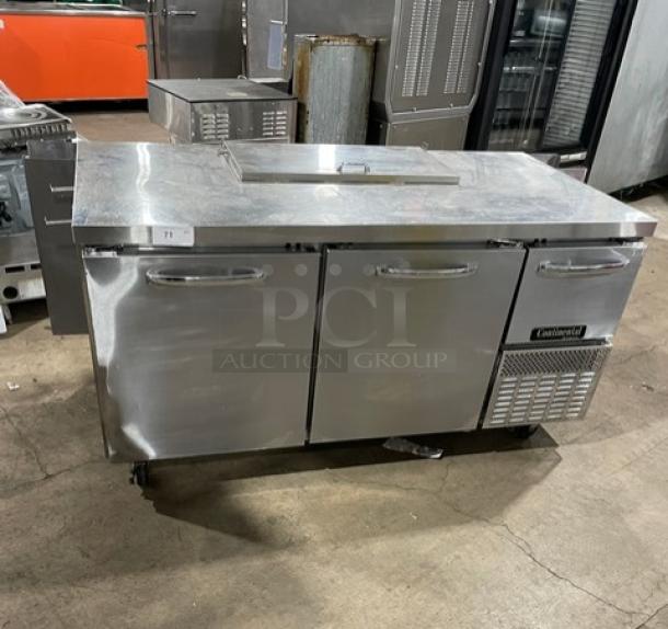 Continental stainless steel refrigerated prep table, model RA68NB. Features 2-1/2 doors, poly coated rack, on casters.