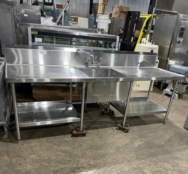 Custom stainless steel sink worktop table with backsplash, swivel spout faucet, dual-sided undershelf. Excellent condition.