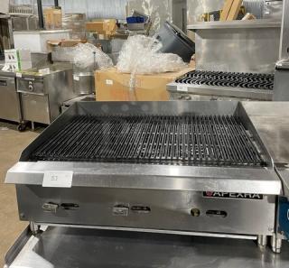 Apexra commercial stainless steel gas char broiler with back and side splash, on legs, like new condition.