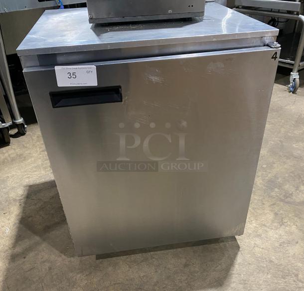 Delfield stainless steel undercounter refrigerator, model 406CADD1. Features poly coated wire racks, on casters. Model: 406CADD1.