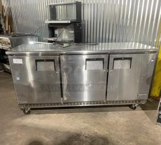Everest ETBR3 stainless steel 3-door undercounter refrigerator, poly coated rack, on casters, 115V, S/N BTBR317030062.