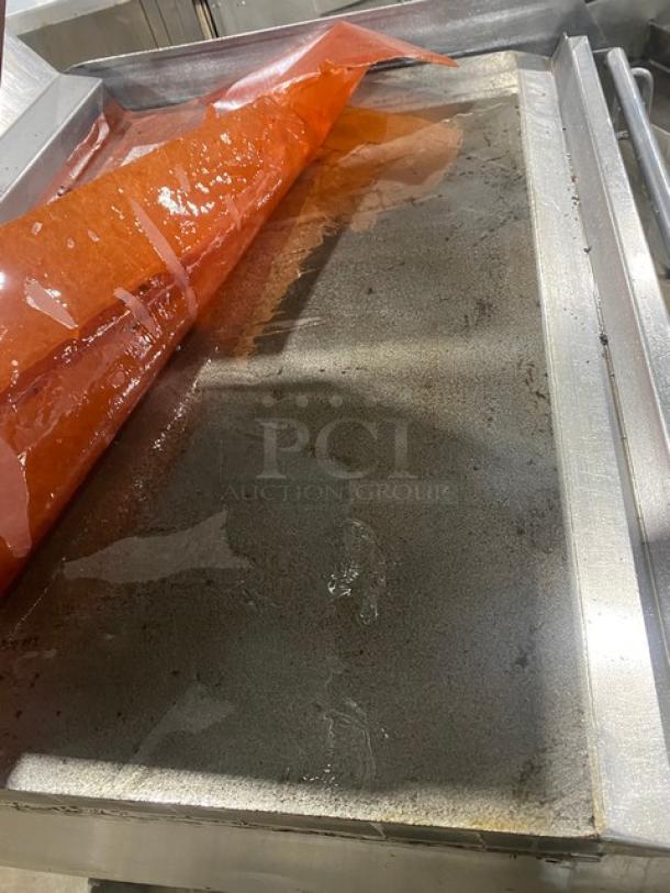 Taylor Commercial Stainless Steel Flat Griddle, Model L813, dual-sided, 36", with double platen and 3-lane. On casters.