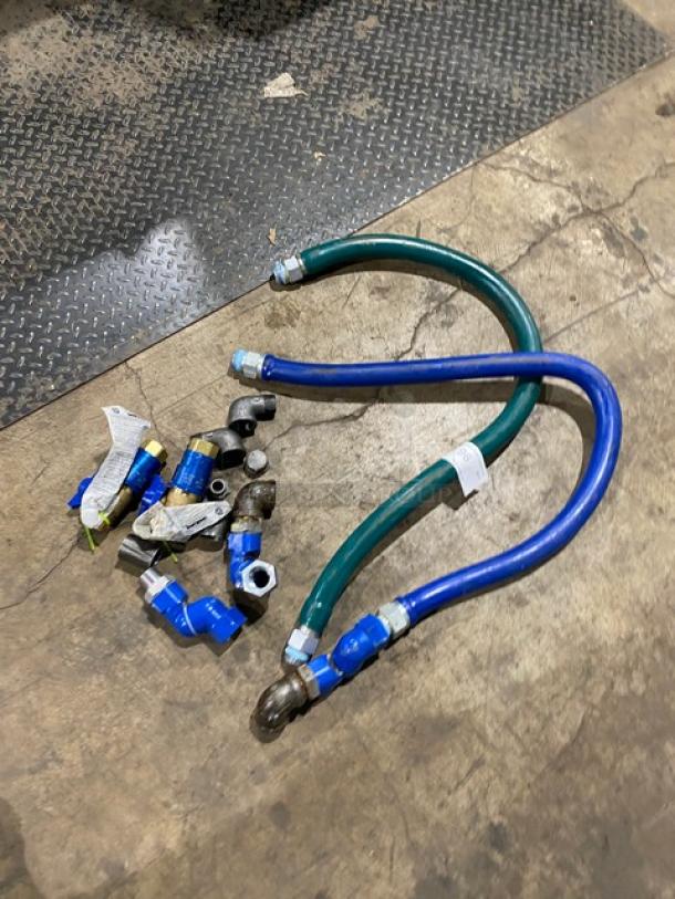 Dormont commercial assorted gas connectors, featuring blue and green flexible hoses, fittings; used condition.