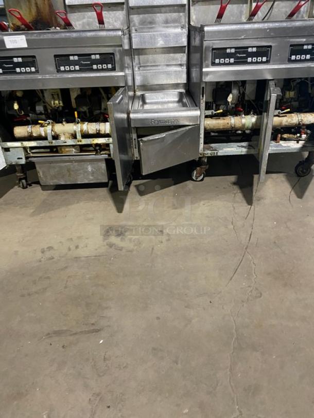 Frymaster FMPH455SC 4-bay 50 lb. fryer system, stainless steel, natural gas, digital control, with oil filter, on casters.