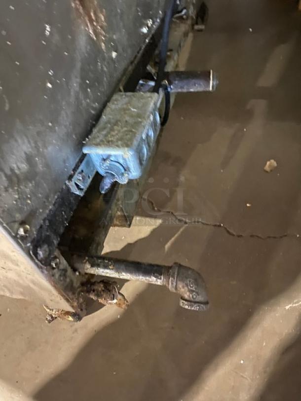 Frymaster FMPH455SC 4-bay 50 lb. commercial fryer system, natural gas, digital control, on casters, with oil filter, center dump station, and basket hangers.