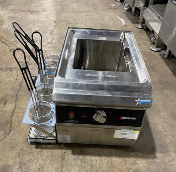 Omcan 41882 commercial stainless steel electric pasta cooker with basket holder, mesh baskets, and 240V power.
