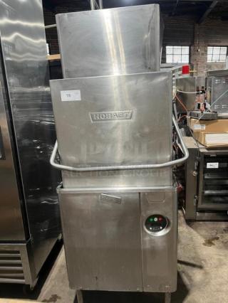 Hobart Advansys commercial stainless steel dishwashing machine on legs, electric-powered, door-type, in used condition.