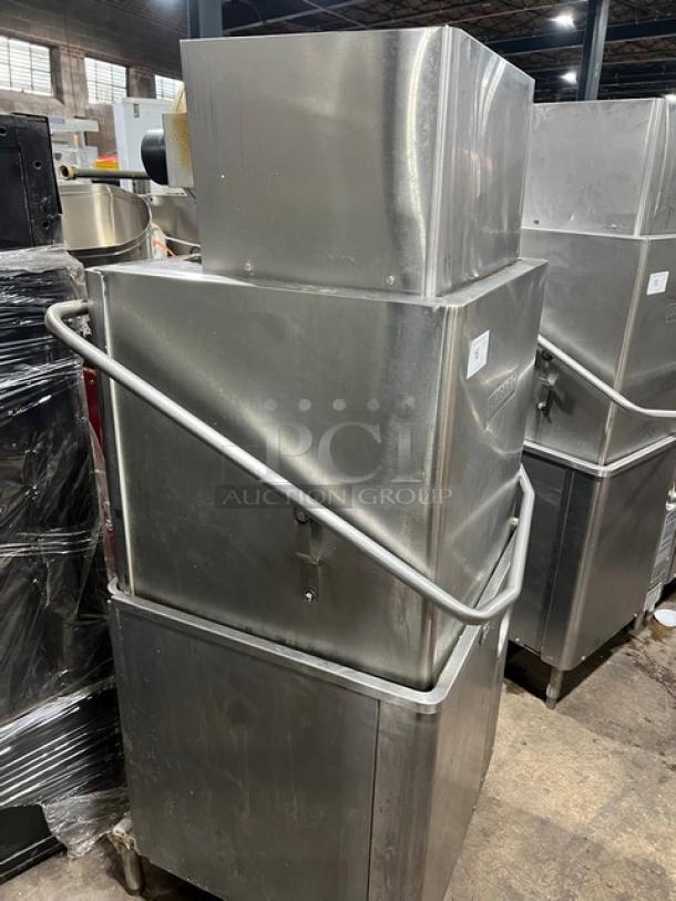 Hobart Advansys Series stainless steel door-type dishwasher, electric, commercial use, mounted on legs, in used condition.