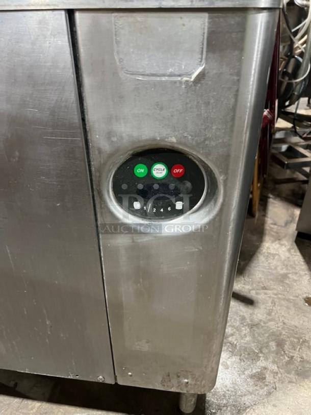 Hobart Advansys Series stainless steel commercial dishwasher, door-type, electric powered, on legs, visible control buttons.