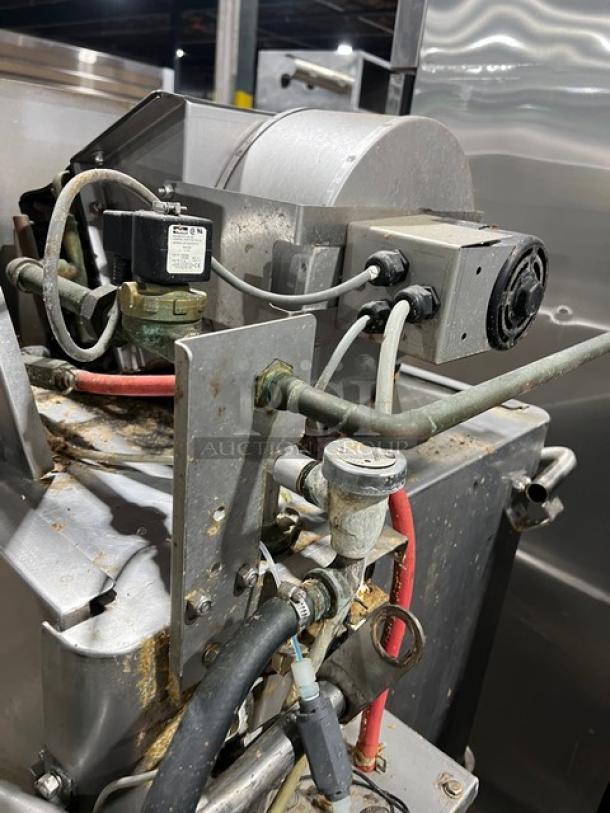 Hobart Advansys Series commercial stainless steel door-type dishwasher, electric-powered, on legs, visible wiring and components.