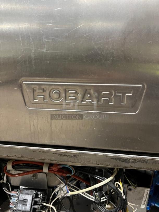 Hobart LXEH commercial dishwasher, stainless steel, visible wiring, robust design, model number 23-1147-948.