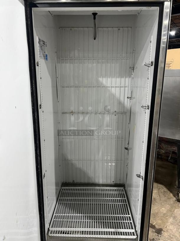 True T-23F stainless steel commercial single door reach-in freezer. Energy Star certified, with poly-coated wire rack, on casters.