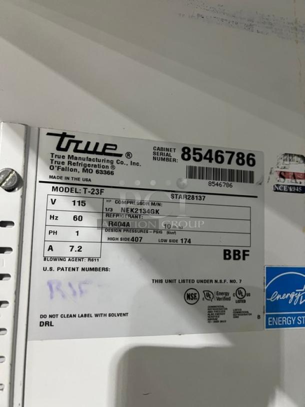 True T-23F commercial stainless steel single door freezer, Energy Star certified, with poly coated wire rack, on casters. Model: T-23F. SN: 8546786. 115V, 1 phase.