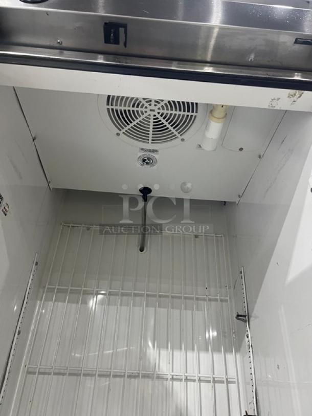 True T-23F commercial stainless steel single door reach-in freezer, Energy Star certified, with poly coated wired rack. Model T-23F SN: 8546786, 115V 1 Phase, on casters.