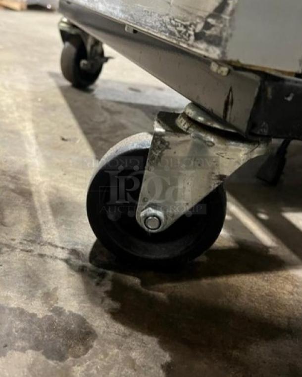 True T-23F stainless steel reach-in freezer; Energy Star certified; poly-coated wire rack; on casters for mobility.